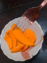 Red mangoes with the bowl Royalty Free Stock Photo