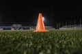 Orange cone for training football on the field Royalty Free Stock Photo