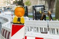 Orange construction Street barrier light on barricade. Road cons Royalty Free Stock Photo