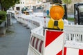 Orange construction Street barrier light on barricade. Road cons Royalty Free Stock Photo