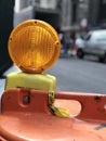 Orange Construction warning light on the street Royalty Free Stock Photo