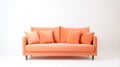 An orange couch with four pillows on top of it, peach fuzz, trendy color of the year 2024. Royalty Free Stock Photo