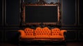 an orange couch with a frame displayed on an ornate wall Royalty Free Stock Photo