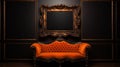 an orange couch with a frame displayed on an ornate wall Royalty Free Stock Photo