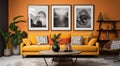 an orange couch with framed pictures in a living room Royalty Free Stock Photo