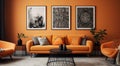 an orange couch with framed pictures in a living room Royalty Free Stock Photo