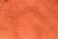 Orange creased crepe paper background texture Royalty Free Stock Photo