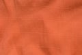 Orange creased crepe paper background texture Royalty Free Stock Photo