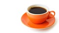 An orange cup of coffee on an orange saucer Royalty Free Stock Photo