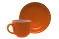 Orange cup and saucer Royalty Free Stock Photo