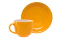 Orange cup and saucer Royalty Free Stock Photo