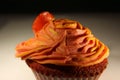 Orange Cupcake with stawberry jam and piece of strawberry