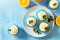 Orange Cupcakes with Curd Cream on the Christmas Festive Table. Top view flat lay background Royalty Free Stock Photo