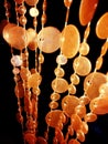 Orange curtain capiz shells