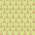 Orange cute bulb with green short onion feathers on a light positive yellow-green background texture seamless pattern Royalty Free Stock Photo