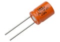 Orange cylindrical capacitor with 102.3pf capacitance rating and axial leads Royalty Free Stock Photo