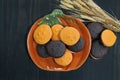 Orange and dark chocolate whoopie pie cookies with vanilla filling. Overhead view