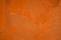 Orange decorative relief plaster on wall Royalty Free Stock Photo