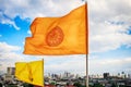Dharmachakra flag and HM King Bhumibol AdulyadejÃ¢â¬â¢s flag on top of the phu khao thong or golden mountain of wat saket, Thailand