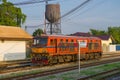 Orange diesel locomotive at the railway station