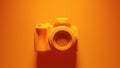 Orange DLSR Camera with Orange Background Royalty Free Stock Photo