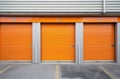 Orange door Self Storage Units hallway perspective Royalty Free Stock Photo