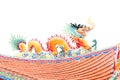 Orange Dragon sculpture on the roof. Royalty Free Stock Photo