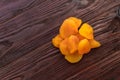 Orange dried apricot on a dark wooden table textural Royalty Free Stock Photo