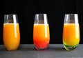 Orange Drink in Shot Glasses