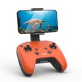 Orange Drone Remote Controller with Smartphone Displaying Sea Turtle and Fish image photo Royalty Free Stock Photo