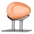 Orange easter egg on metal stand Royalty Free Stock Photo