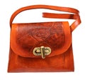 Orange embossed leather handbag cutout on white