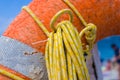 Orange emergency lifebuoy on a pebbly sea beach, close up Royalty Free Stock Photo