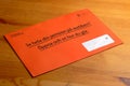 Orange envelope with the annual statement