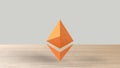 Orange Ethereum gold sign icon on wood table white background. 3d render isolated illustration, cryptocurrency, crypto, business,