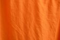 Detail of a orange fabric texture. Royalty Free Stock Photo