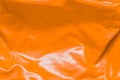 Orange faux leather material texture background surface abstract