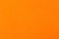 Orange felt texture for design on macro. Royalty Free Stock Photo