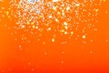 Festive trendy orange and blue background with sparkles