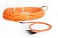 Orange fiber optic ST connector patchcord Royalty Free Stock Photo