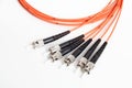 Orange fiber optic ST connector patchcord Royalty Free Stock Photo
