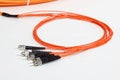 Orange fiber optic ST connector patchcord Royalty Free Stock Photo