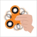 Orange fidget spinner Royalty Free Stock Photo