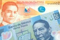 Orange Filipino money close up with Money from Mexico