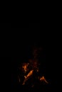 Orange fire flames isolated on pure black Royalty Free Stock Photo