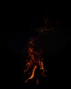 Orange fire flames isolated on pure black Royalty Free Stock Photo