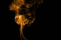 Orange fire smoke on black background Royalty Free Stock Photo