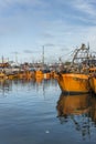 Orange fishing boats in Mar del Plata, Argentina