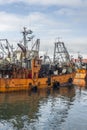 Orange fishing boats in Mar del Plata, Argentina