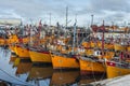 Orange fishing boats in Mar del Plata, Argentina